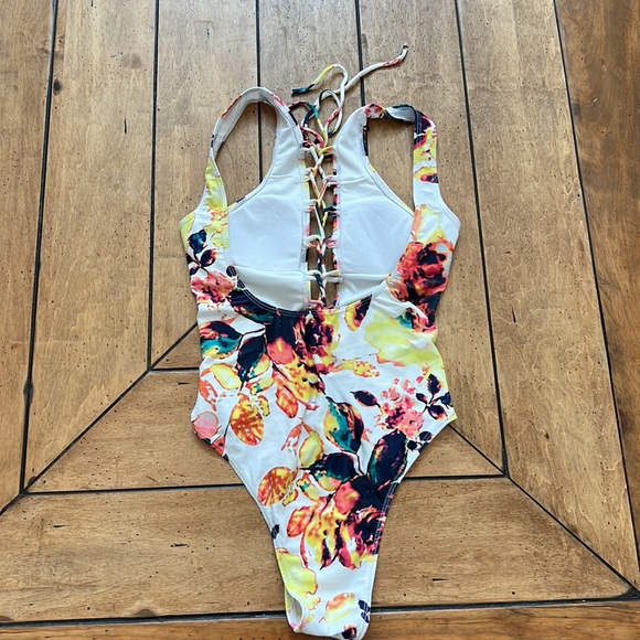 Gorgeous one piece lace up swimsuit. Brand unknown. Size Medium. - Picture 3 of 5